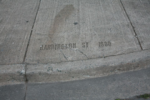 Street name written in conrete of pavewalk