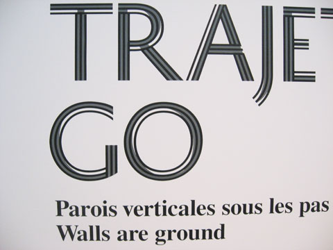 Words 'Trajet/Go' on exhibition wall