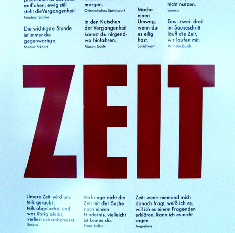 Poster with Letterpress prints. Written is the word 'Zeit' and other poems