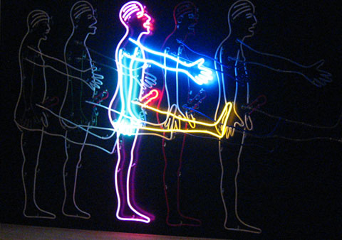 A man in movement, a neon art piece by Bruce Nauman