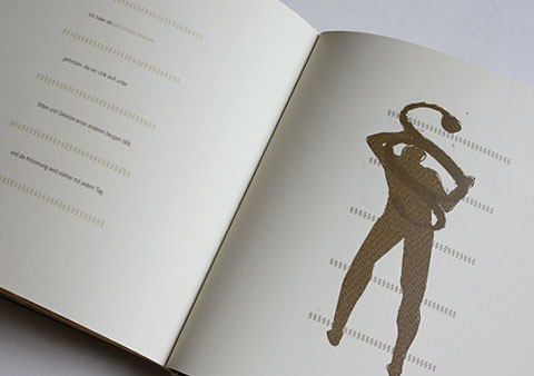 Double-sides page of the book Slavery showing a man with the low sign