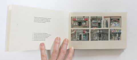 Page with photographs in Lettering depanneur signs book