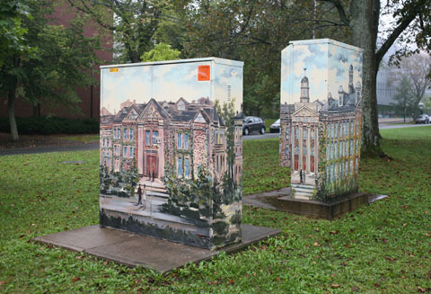 Feeder pillars containing a painting of a building