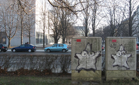 Exterior of the museums building Pinakothek der Moderne with sight from the park