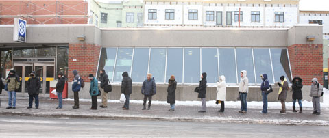 People waiting for the bus at Bus stop #460/202, Metro Station Du College, Montreal February 6 2007