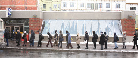 People waiting for the bus at Bus stop #460/202, Metro Station Du College, Montreal on February 8 2007