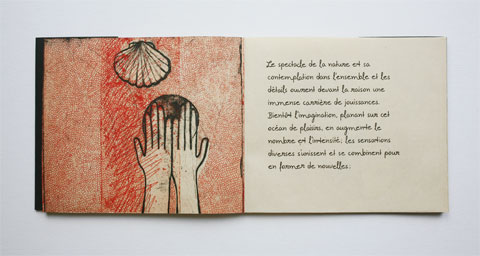 Book page with illustrated hands and text page