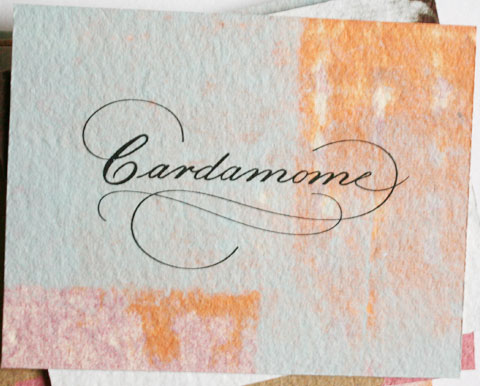 Card with the letters cardamome
