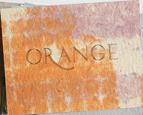  Card with the letters orange