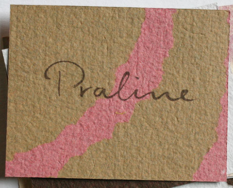 Card with the letters praline