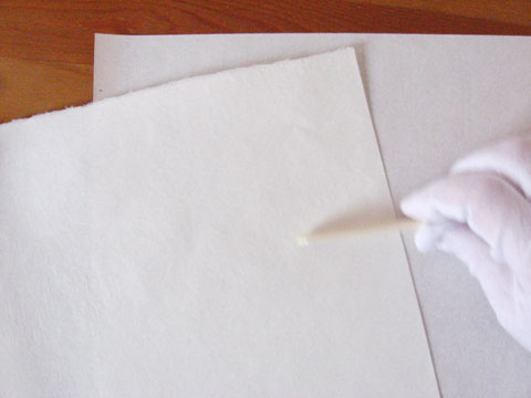 Folding the sheet of paper